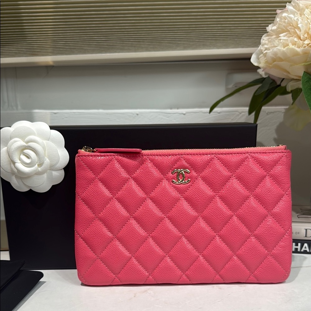 Authentic small CHANEL O Case in Pink Quilted Clutch
